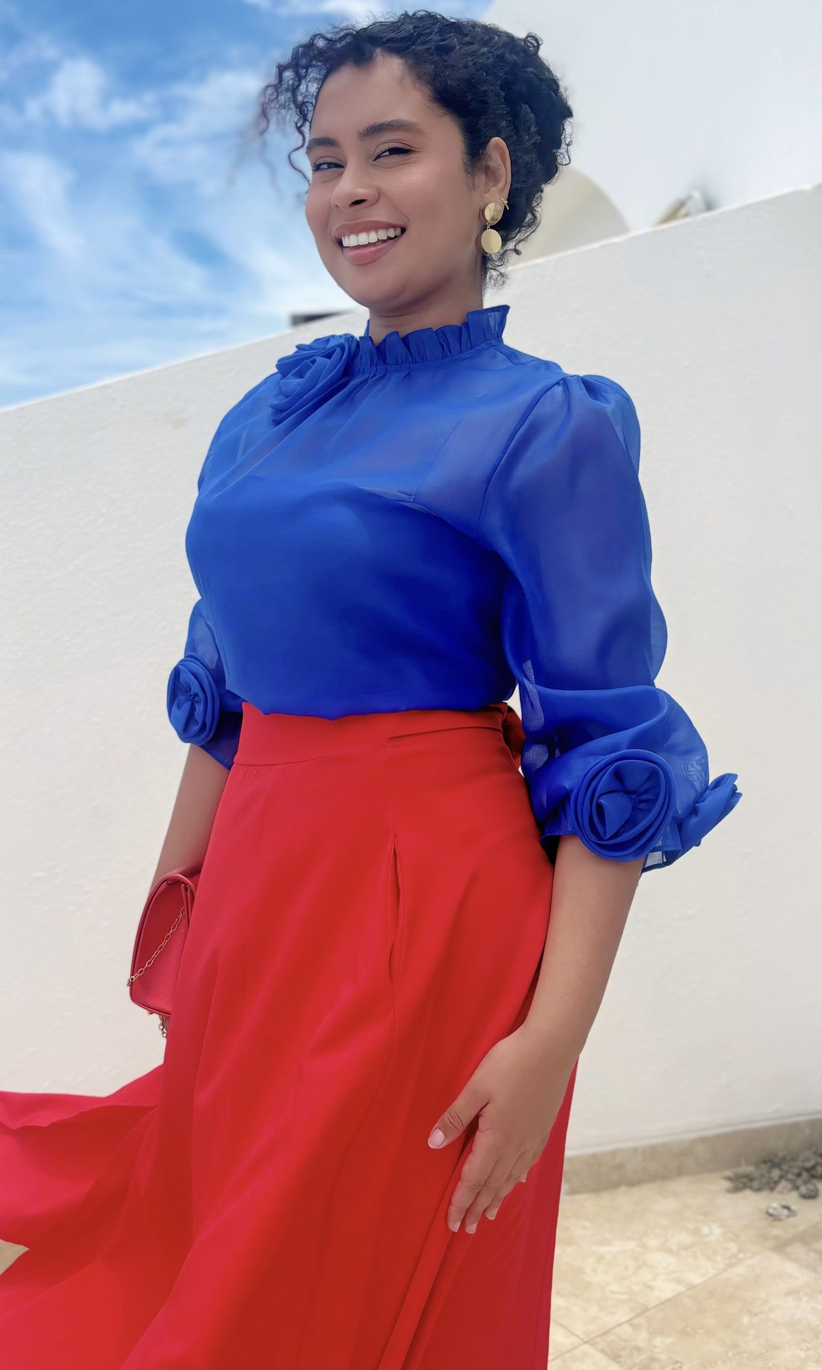Blusa Rosetas Cuello Alto Azul