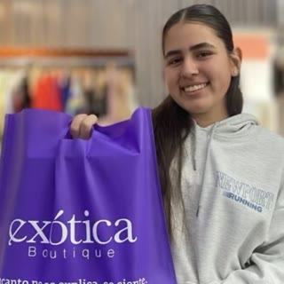 Clienta feliz de Exótica